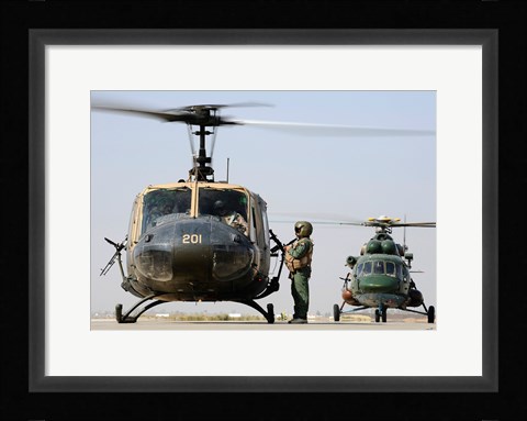 Framed Iraqi air force carries wounded warrior on aeromedical evacuation mission Print
