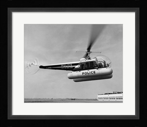 Framed Low angle view of a helicopter in flight, Bell 47-D, Bell Aircraft Corporation Print