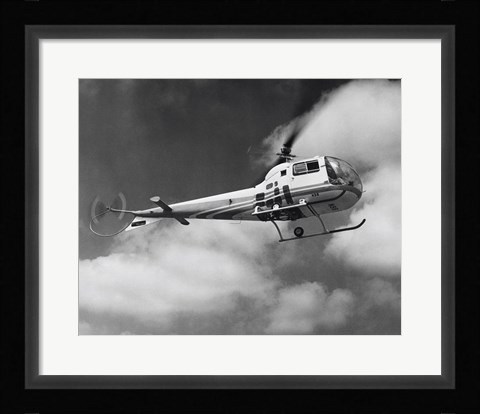 Framed Low angle view of a helicopter in flight in the sky, Bell Helicopter Print