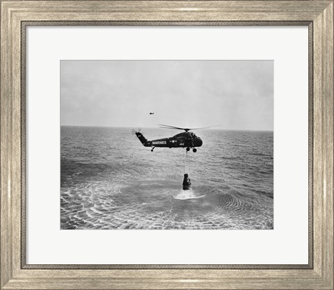 Framed Marine helicopter lifting the astronaut spacecraft out of the Ocean Print