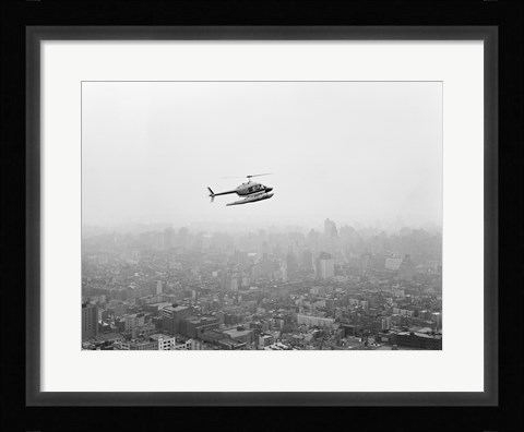 Framed USA, New York State, New York City, Helicopter over city Print