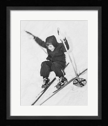 Framed Boy skiing on snow Print