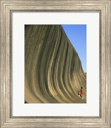Framed Person climbing Wave Rock, Western Australia, Australia Print