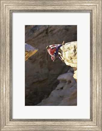 Framed High Angle View of a Man hanging off of a Summit Print
