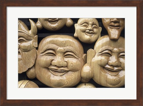 Framed Close-up of Faces of Laughing Buddha, Vietnam Print