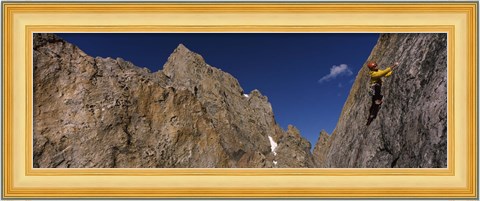 Framed Man climbing up a mountain, Grand Teton, Grand Teton National Park, Wyoming, USA Print