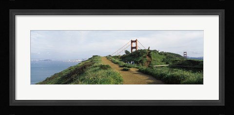 Framed Path leading towards a suspension bridge, Golden Gate Bridge, San Francisco, California, USA Print