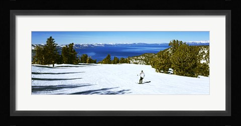 Framed Tourist skiing in a ski resort, Heavenly Mountain Resort, Lake Tahoe, California-Nevada Border, USA Print