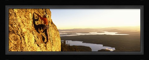Framed Man climbing up a mountain, Rockchuck Peak, Grand Teton National Park, Wyoming, USA Print
