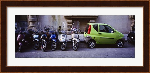 Framed Motor scooters with a car parked in a street, Florence, Italy Print