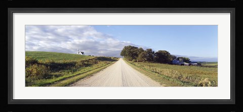 Framed Dirt road leading to a church, Iowa, USA Print