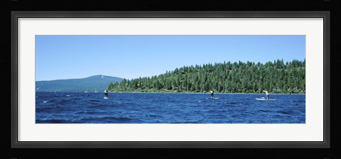 Framed Tourists paddle boarding in a lake, Lake Tahoe, California, USA Print