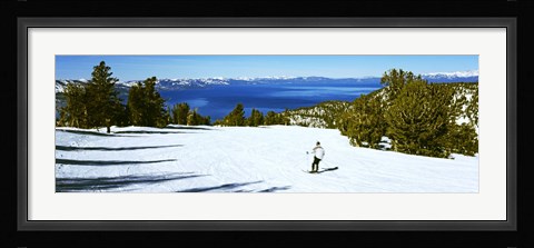 Framed Tourist skiing in a ski resort, Heavenly Mountain Resort, Lake Tahoe, California-Nevada Border, USA Print