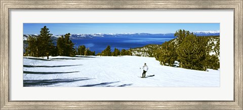 Framed Tourist skiing in a ski resort, Heavenly Mountain Resort, Lake Tahoe, California-Nevada Border, USA Print