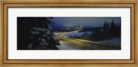 Framed Winding road running through a snow covered landscape, Anchorage, Alaska, USA Print