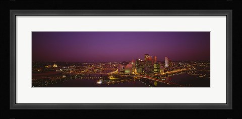 Framed High angle view of buildings lit up at night, Three Rivers Stadium, Pittsburgh, Pennsylvania, USA Print