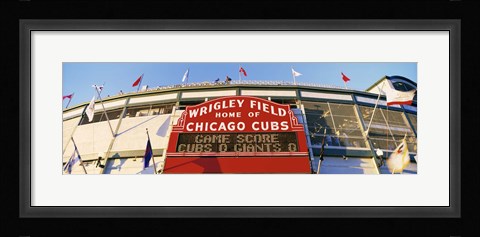 Framed Red score board outside Wrigley Field,USA, Illinois, Chicago Print