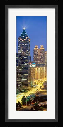 Framed Skyscrapers lit up at night, Atlanta, Georgia, USA Print