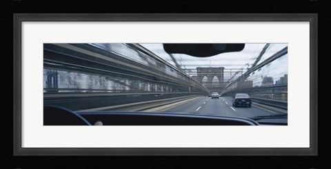 Framed Cars moving on the bridge, Brooklyn Bridge, New York City, New York State, USA Print