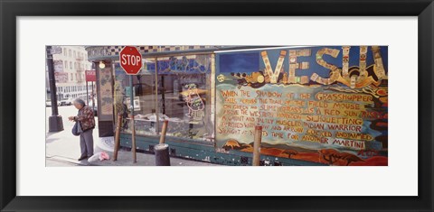 Framed USA, California, San Francisco, Little Italy, Senior man standing outside a bar Print