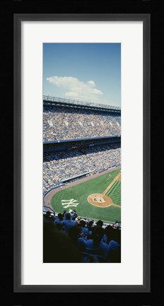 Framed High angle view of spectators watching a baseball match in a stadium, Yankee Stadium, New York City, New York State, USA Print