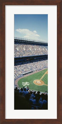 Framed High angle view of spectators watching a baseball match in a stadium, Yankee Stadium, New York City, New York State, USA Print