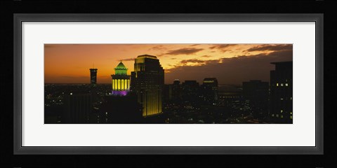 Framed High angle view of buildings lit up at dusk, New Orleans, Louisiana, USA Print