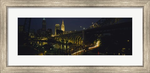 Framed Arch bridge and buildings lit up at night, Cleveland, Ohio, USA Print