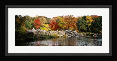 Framed Group of people sitting on rocks, Central Park, Manhattan, New York City, New York, USA Print