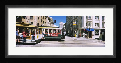 Framed Two cable cars on a road, Downtown, San Francisco, California, USA Print