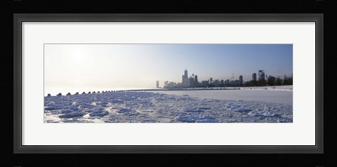 Framed Frozen lake with a city in the background, Lake Michigan, Chicago, Illinois Print
