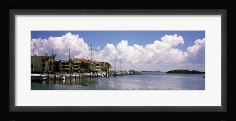Framed Boats docked in a bay, Cabbage Key, Sunshine Skyway Bridge in Distance, Tampa Bay, Florida, USA Print