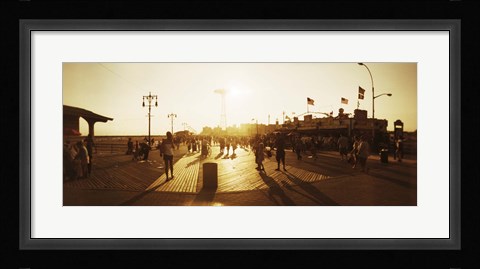 Framed Tourists walking on a boardwalk, Coney Island Boardwalk, Coney Island, Brooklyn, New York City, New York State, USA Print