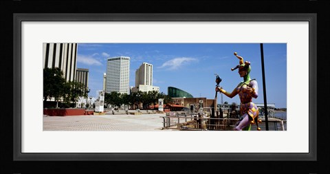 Framed Jester statue with buildings in the background, Riverwalk Area, New Orleans, Louisiana, USA Print