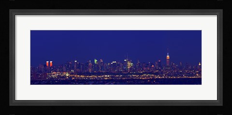 Framed Buildings in a city lit up at night, Upper Manhattan, Manhattan, New York City, New York State, USA Print