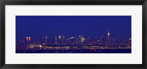 Framed Buildings in a city lit up at night, Upper Manhattan, Manhattan, New York City, New York State, USA Print