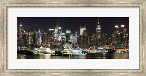 Framed Buildings in a city lit up at night, Hudson River, Midtown Manhattan, Manhattan, New York City, New York State, USA Print
