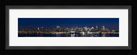 Framed Buildings in a city lit up at dusk, Hudson River, Midtown Manhattan, Manhattan, New York City, New York State, USA Print