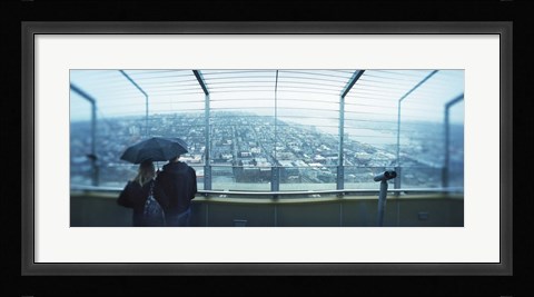 Framed Couple viewing a city from the Space Needle, Queen Anne Hill, Seattle, Washington State, USA Print