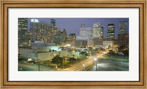 Framed Skyscrapers lit up at night, Houston, Texas Print