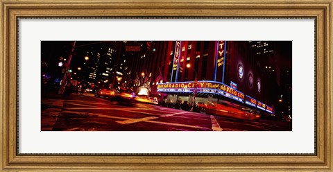 Framed Low angle view of buildings at night, Radio City Music Hall, Rockefeller Center, Manhattan, New York City, New York State, USA Print