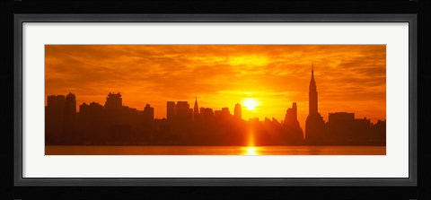 Framed Birght Orange Sky and Sun Behind the New York City Skyline Print