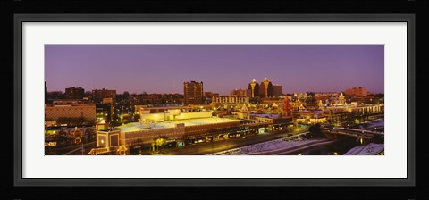 Framed High angle view of buildings lit up at dusk, Kansas City, Missouri, USA Print
