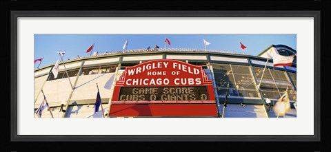 Framed Red score board outside Wrigley Field,USA, Illinois, Chicago Print