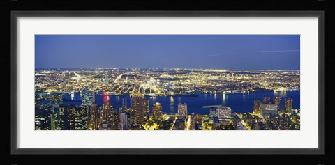 Framed Aerial View Of Buildings Lit Up At Dusk, Manhattan Print