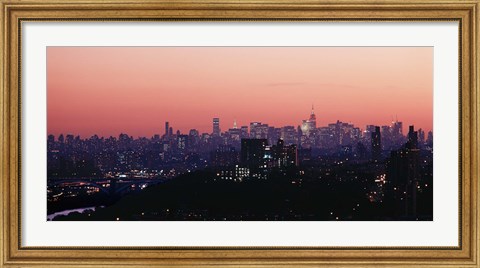 Framed High angle view of buildings lit up at dusk, Manhattan, New York City, New York State, USA Print