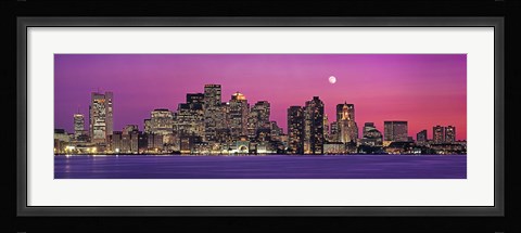 Framed USA, Massachusetts, Boston, View of an urban skyline by the shore at night Print