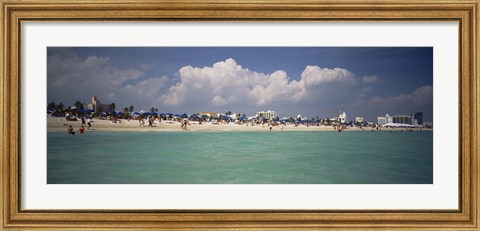 Framed Tourists on the beach, Miami, Florida, USA Print