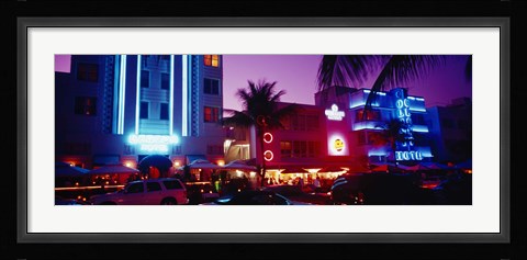 Framed Hotel lit up at night, Miami, Florida, USA Print