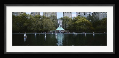 Framed Toy boats floating on water, Central Park, Manhattan Print